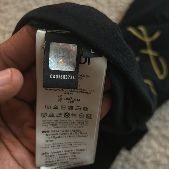 Neatly word Fendi tshirt..fit like an XL pit to pit 22 - Picture 4 of 5